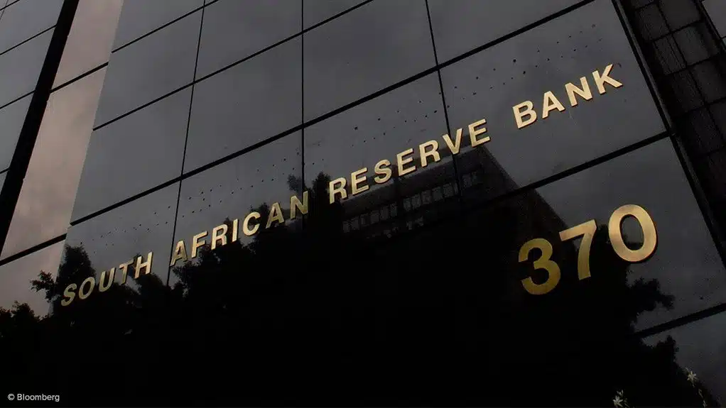 A close-up shot of a glass building with the inscription South African reserve bank written in uppercase and the numbers 370 written below
