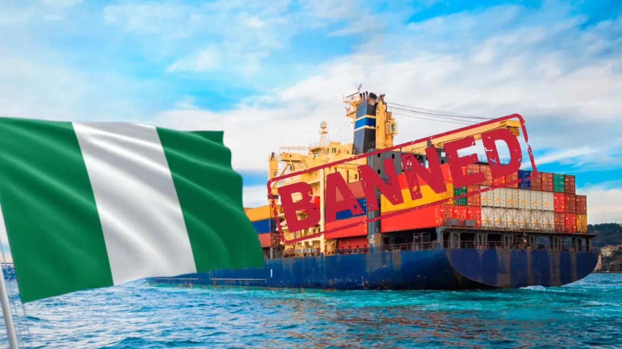 A Nigerian flag and a banned sign on an image of a sailing cargo ship symbolizing the ban on imported goods and services