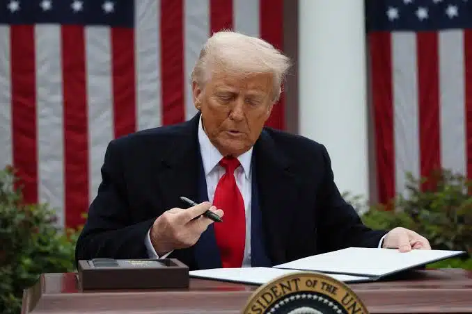 US President Donald Trump signing an executive order