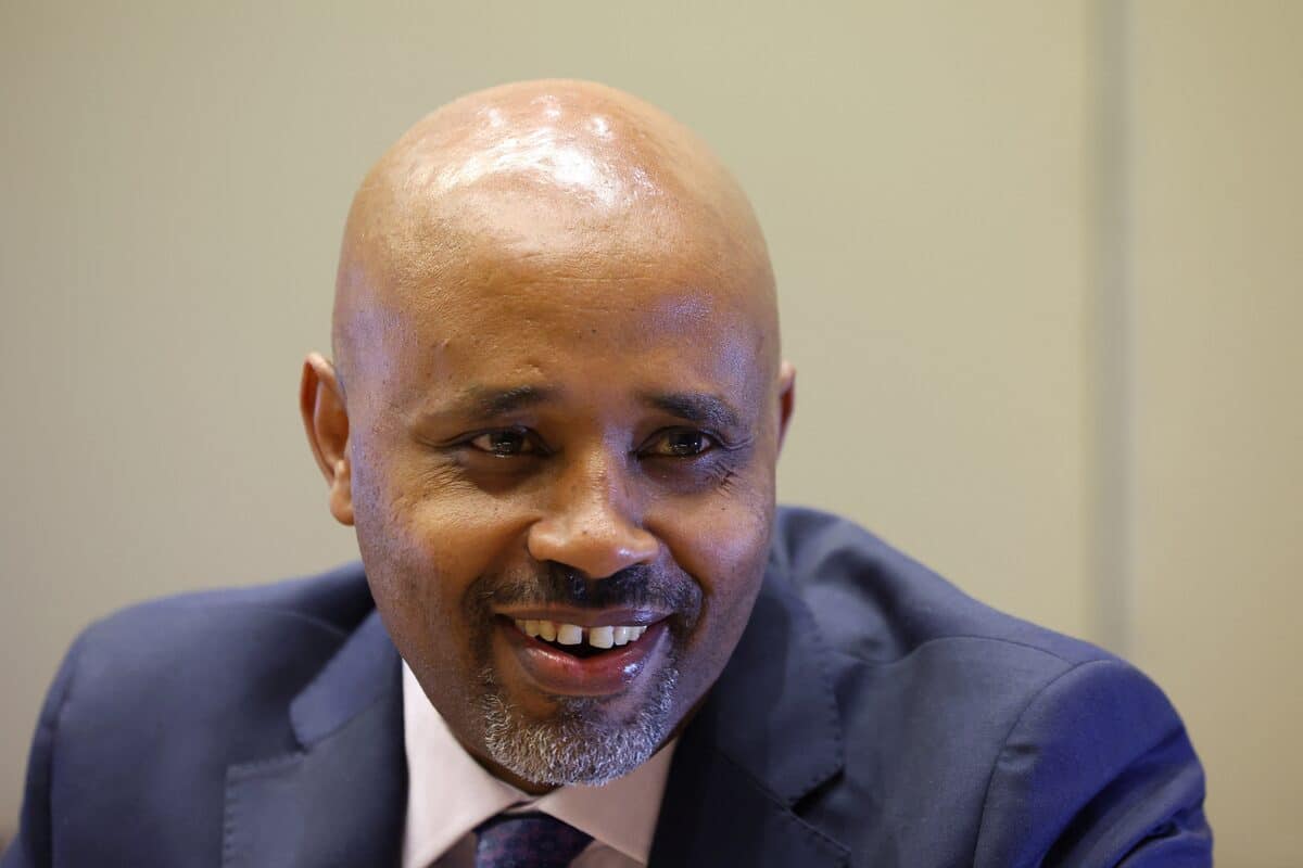 Eyob Tekalign, Ethiopia's State Finance Minister, reacts during an interview with Reuters in London, Britain