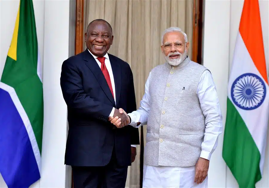 Indian Prime Minister Narendra Modi (R) shakes hands with South African President Cyril Ramaphosa